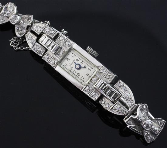 A ladys 1930s/1940s platinum and diamond cocktail watch,